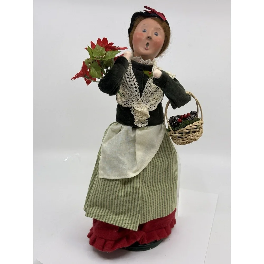 2009 Woman Selling Holiday Flowers By Buyers choice The Carolers